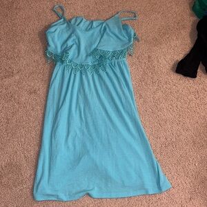 Turquoise blue summer time flowy dress. Perfect for the beach or night out